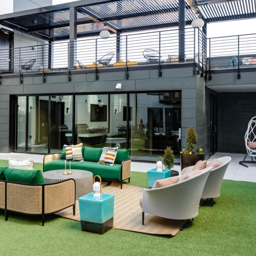 Settle into comfort at Scott's Collection outdoor grills and lounge area on patio