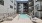 a swimming pool in a courtyard between buildings